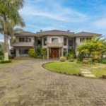 Landscape view of Las Palmeras Luxury Residence in San Ramon, showcasing the expansive estate and lush surroundings, ideal for buyers interested in luxury real estate in Costa Rica.