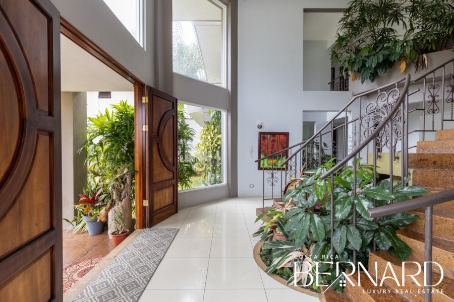 Landscape view of Las Palmeras Luxury Residence in San Ramon, showcasing the expansive estate and lush surroundings, ideal for buyers interested in luxury real estate in Costa Rica.